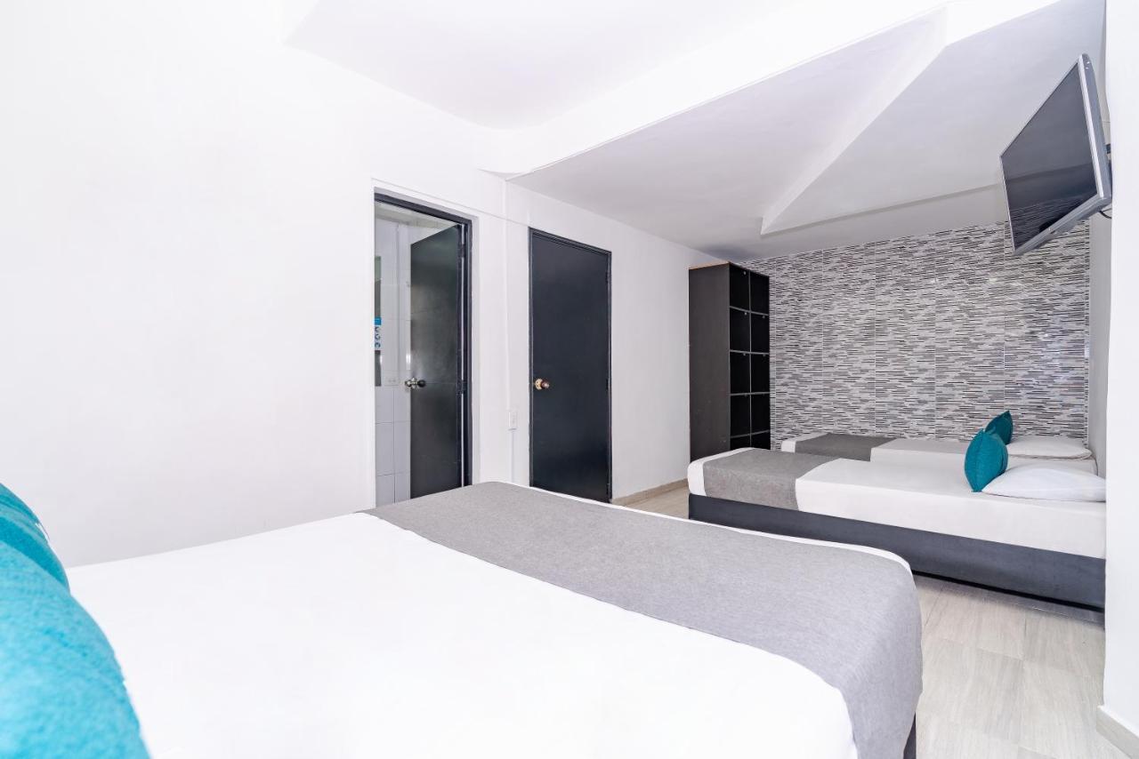 Hotel Tree House Medellin Bagian luar foto